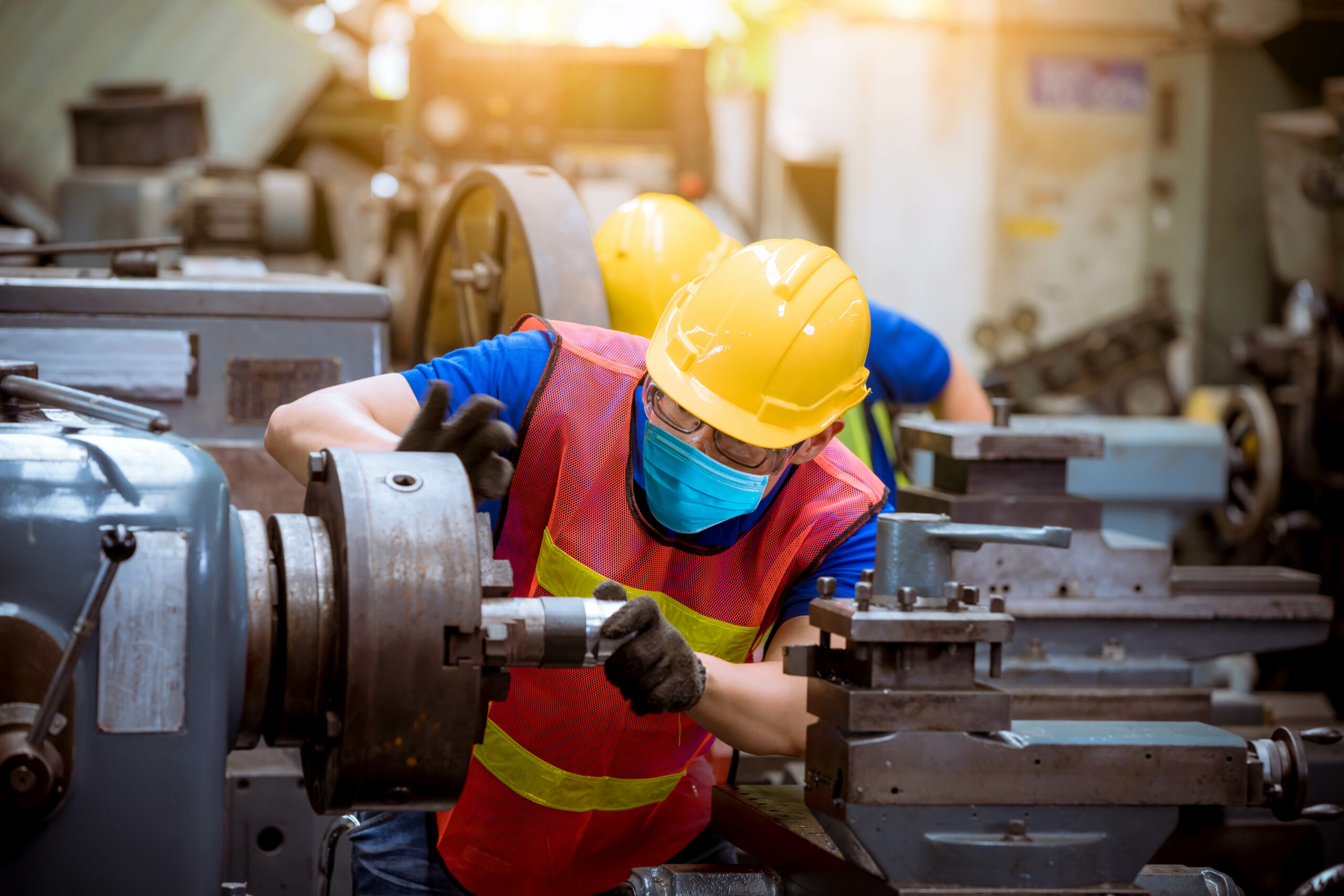 Industry worker wearing glass, ear phone and safety uniform used